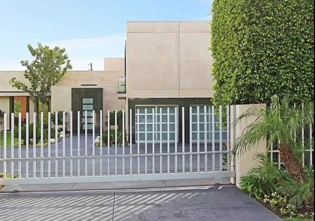 The gated entrance to Nicki Minaj's house in the Flats of Los Angeles, California | image: YouTube/Famous Entertainment