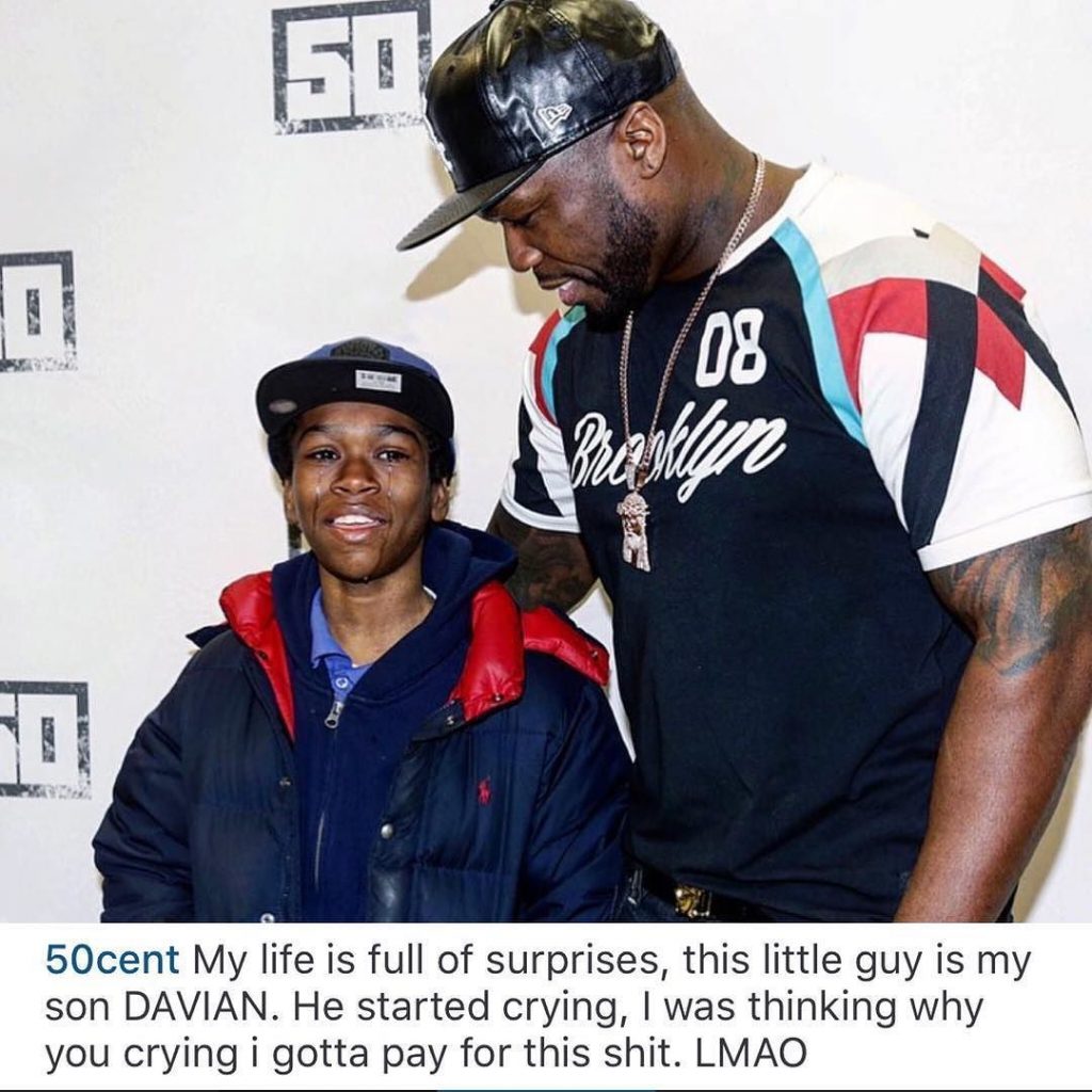 50 Cent poses with a young fan, Davian Frasier once alleged to be his third son | Image: Pinterest