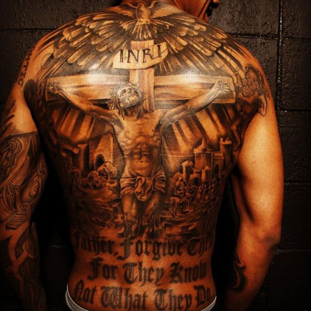 Nick Cannon displays his tattooed neck and back | Image: Pinterest
