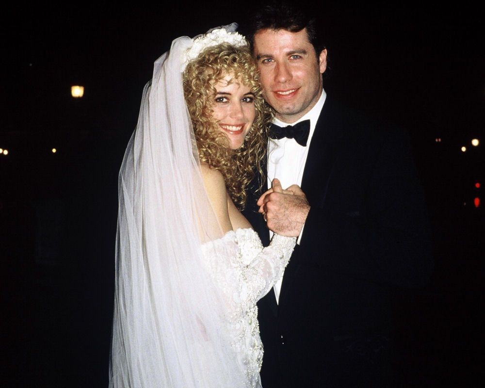 John Travolta and Kelly Prearon at their wedding | Image: Pinterest