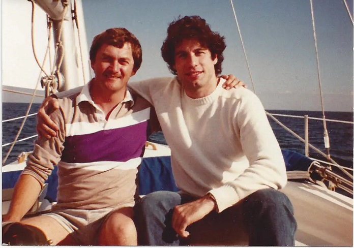 John Travolta and Doug Gotterba aboard a ship