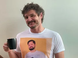 Pedro Pascal holding a mug