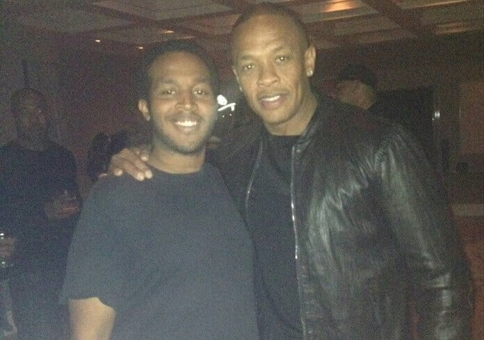 Dr. Dre and Marcel Young posing together for the camera