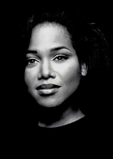 A black and white picture of Michel'le 