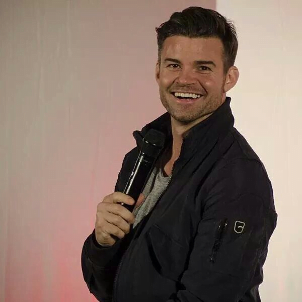 Daniel Gillies with a mic 