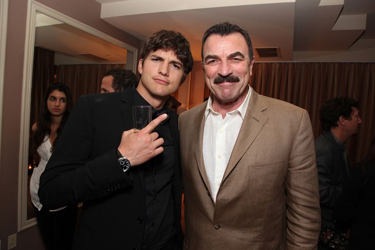 Tom Selleck and Kevin Selleck posing together 