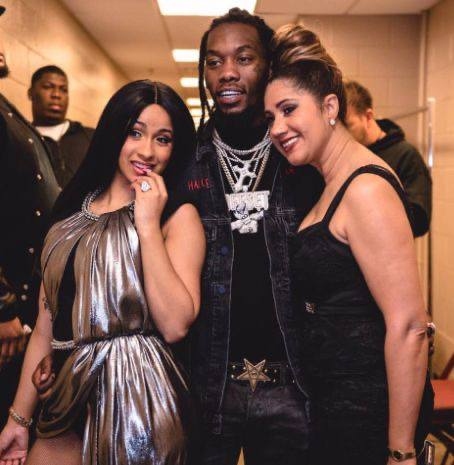 A picture of Clara Almánzar with Cardi B and popular Migos rapper, Offset