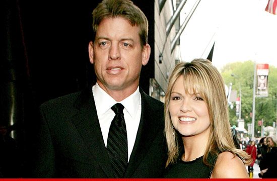 Troy Aikman and Rhonda Worthey posing outdoors together 