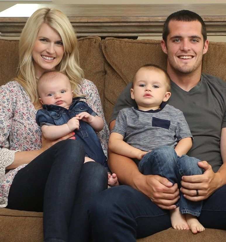 Heather Neel with Derek Carr and two of their kids