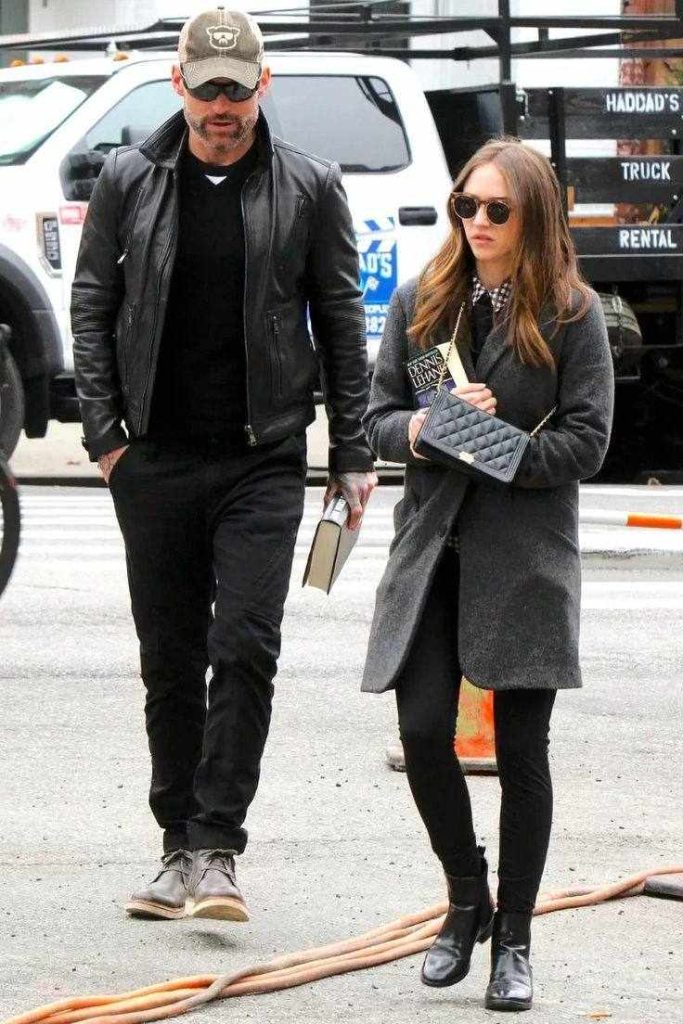 A picture of Olivia Korenberg and her husband taking a walk