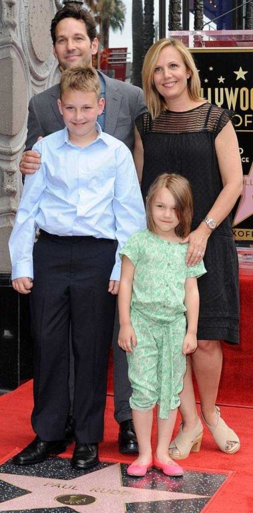 A picture of Darby Rudd with her brother and their parents