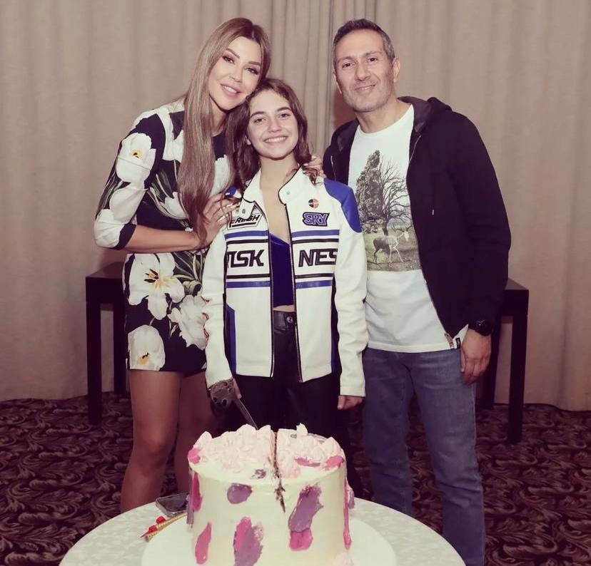 A picture of Carla Diab with her daughter and her ex-husband