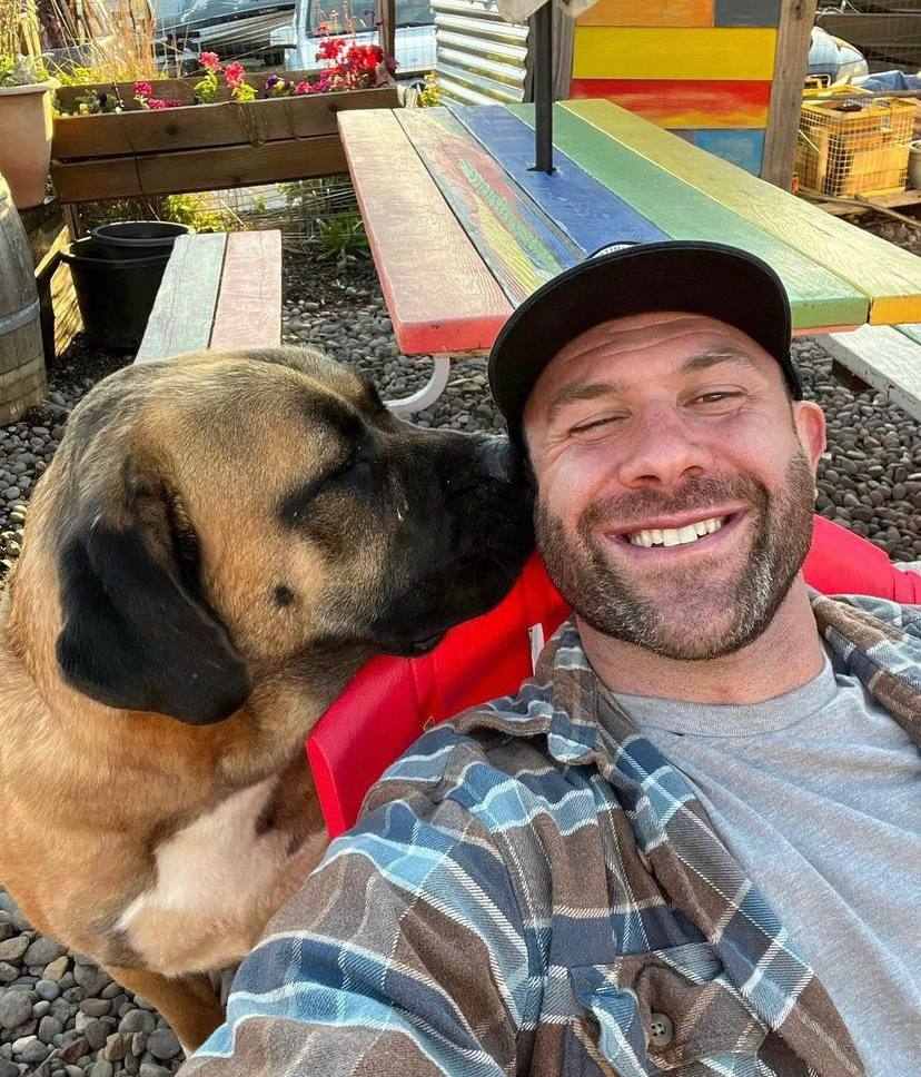 A picture of Lee Asher and one of his dogs