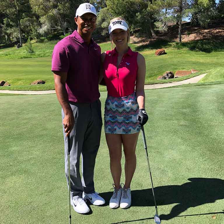 Paige Spiranac with Tiger Woods