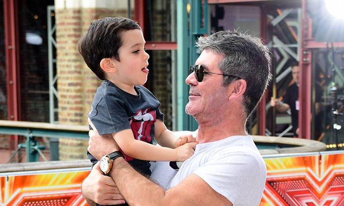 Simon Cowell with his son 