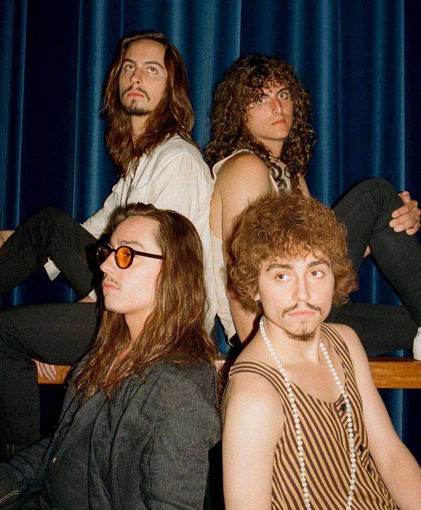 A picture of Josh Kiszka and his band members.