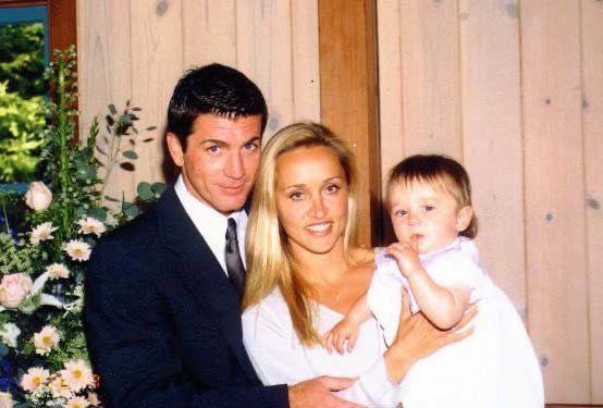 A throwback picture of Kirsten Barlow, her husband, and one of their kids. 