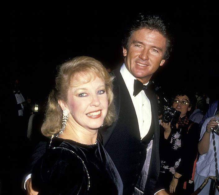 A picture of Carlyn Rosser and her husband at an event.