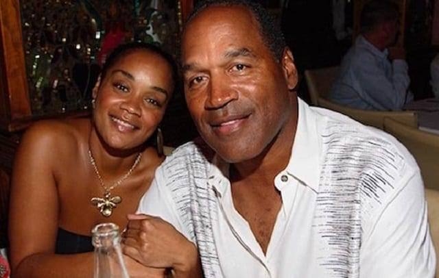 A picture of Arnelle Simpson and her father.