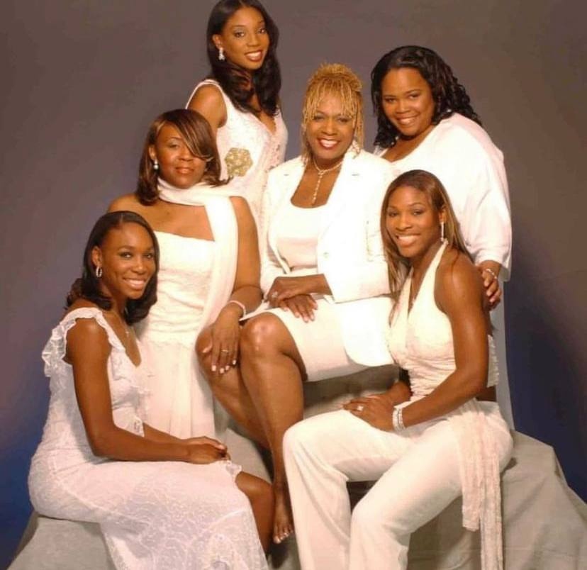 A picture of Isha Price with her siblings and their mother.