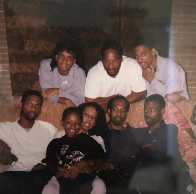 A throwback picture of Andre Rock, his siblings, and their mom.
