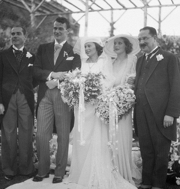 A picture of Josephine Wayne and John Wayne at their wedding ceremony.