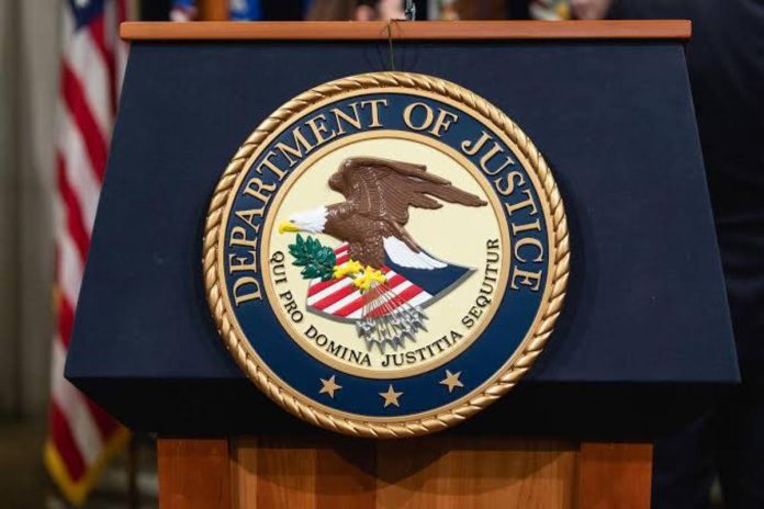 A picture of the Department of Justice logo