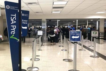 A picture of migrants at the San Diego International Airport