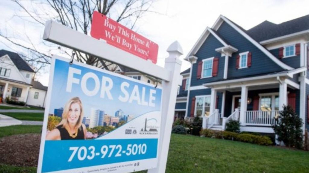 House with a “for sale” sign