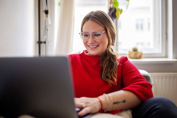 A picture of a gen Z working in the comfort of her home