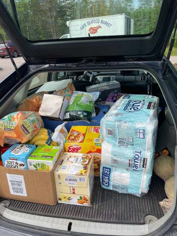 A picture of groceries in a trunk