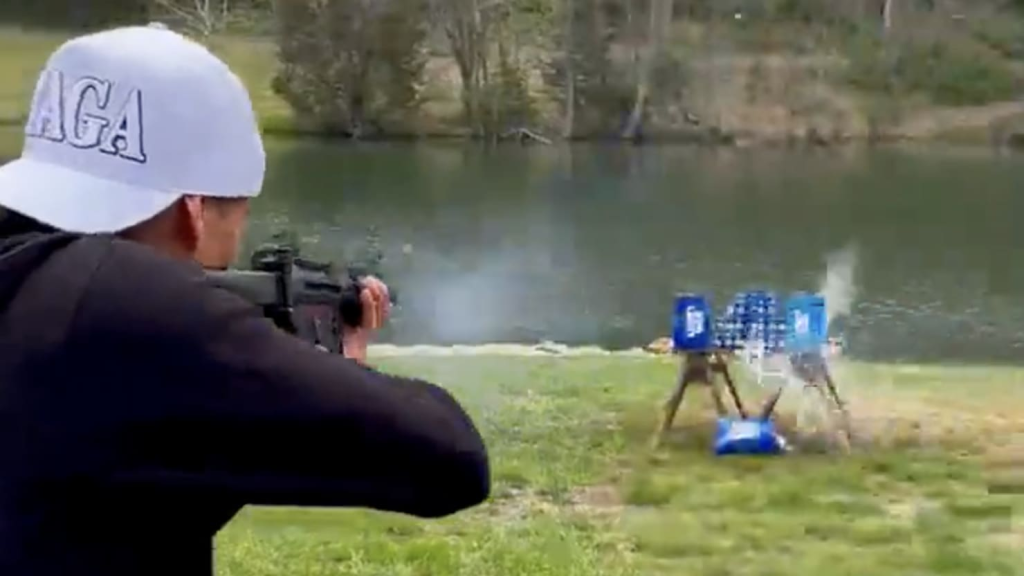 Kid Rock shooting cans of Bud Light