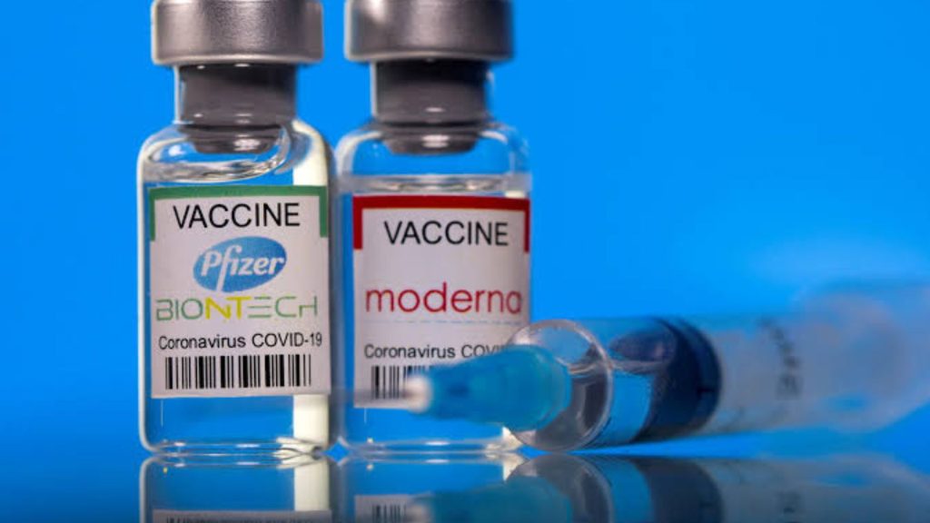 Vials of the Pfizer and Moderna vaccines