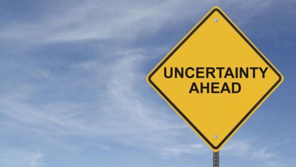 A road sign that reads ‘Uncertainty Ahead’