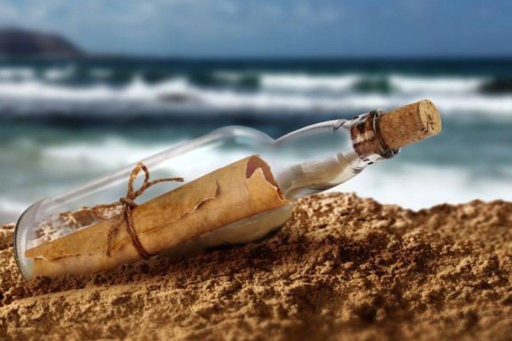 A message in a bottle tossed at the beach