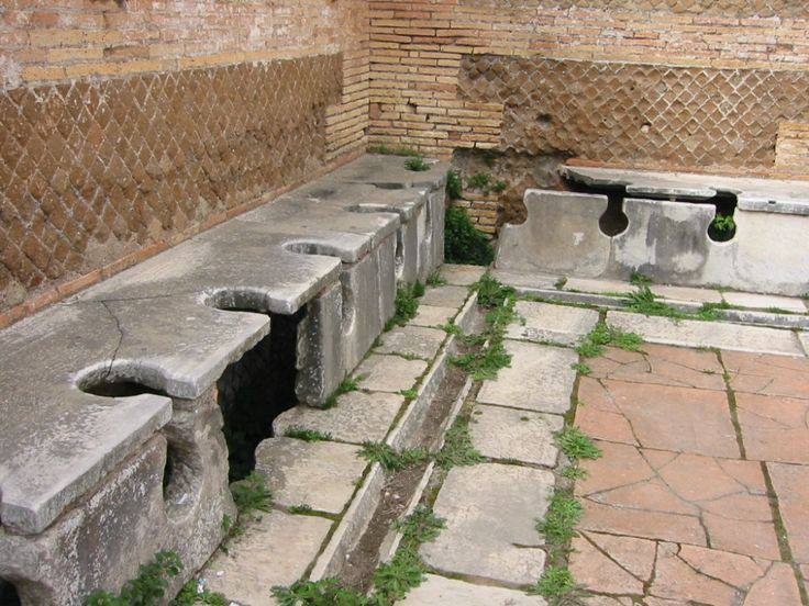 A picture of toilets used in ancient Rome