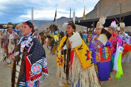 A picture of the Ojibwe tribe in their regalia