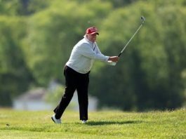 A picture of Former President Donald Trump on his golf course