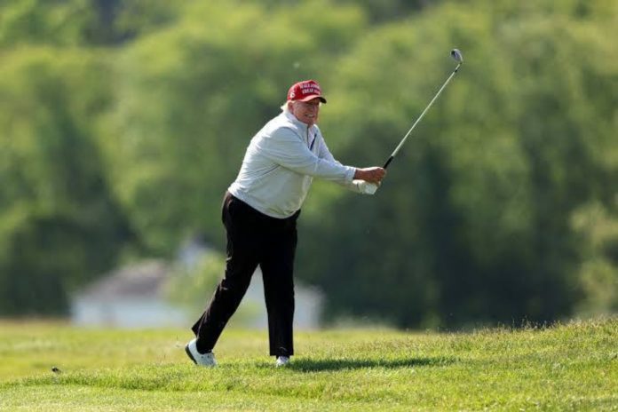 A picture of Former President Donald Trump on his golf course