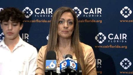 Maha Almasri and her son Jad Abuhamdra at a press conference.