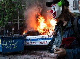 A Chicago Police Vehicle on Fire During the Georgle Floyd Protests