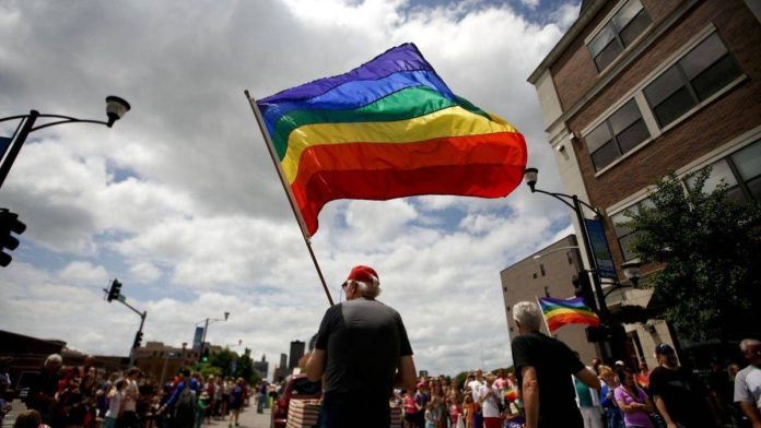 A crowd of LGBTQ+ protesters