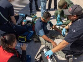 U.S. Border Patrol agents render medical aid to migrants