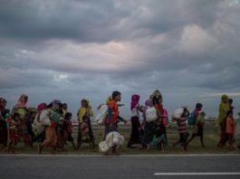 Migrants heading to a camp