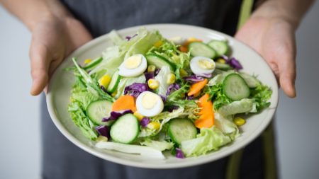 A picture of a salad on a plate.