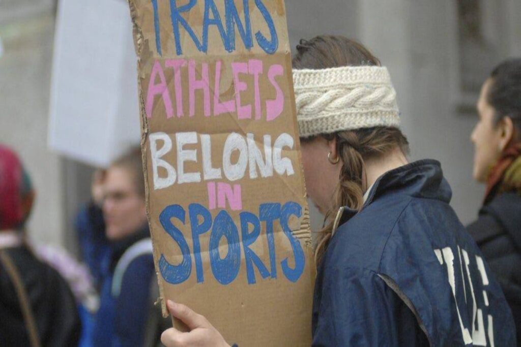 A picture of people protesting trans athletes ban