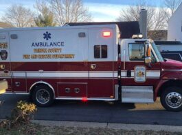 An ambulance along Apple Barrel Court