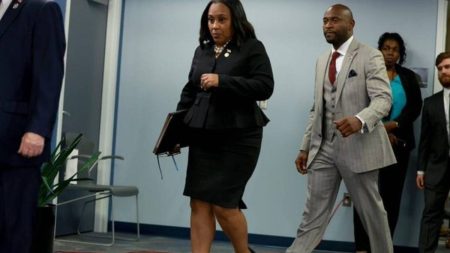 Willis and Wade walking to a press briefing