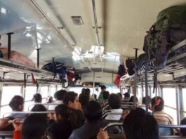 Travelers on a bus.