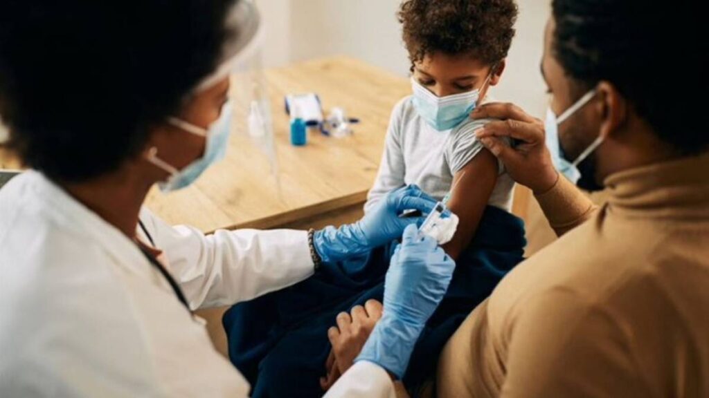 A child receiving measles vaccination
